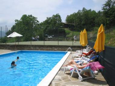 The swimming pool and the tennis court